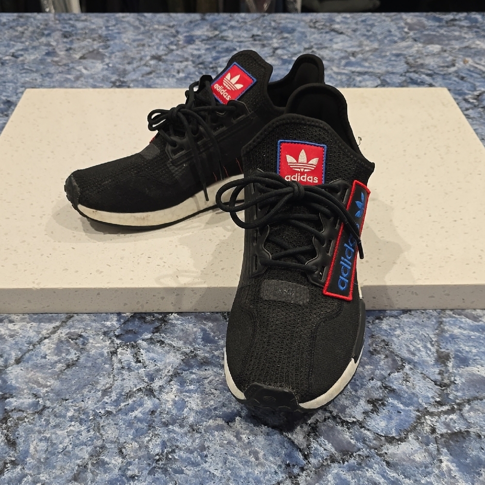 Adidas NMD Black Sneakers with Red and Blue Highlights